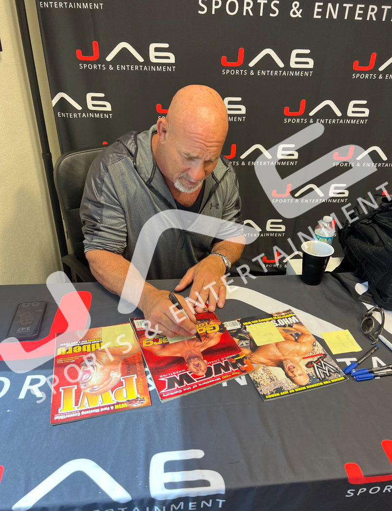 Bill Goldberg autographed signed magazine WWE World of Wrestling JSA The Rock